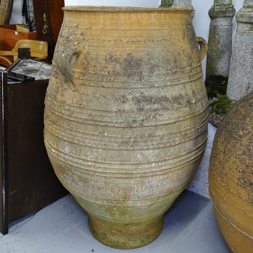 1984 - A large weathered terracotta 2-handled Cretan design oil jar, H110cm