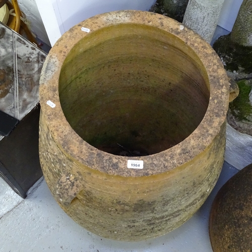 1984 - A large weathered terracotta 2-handled Cretan design oil jar, H110cm