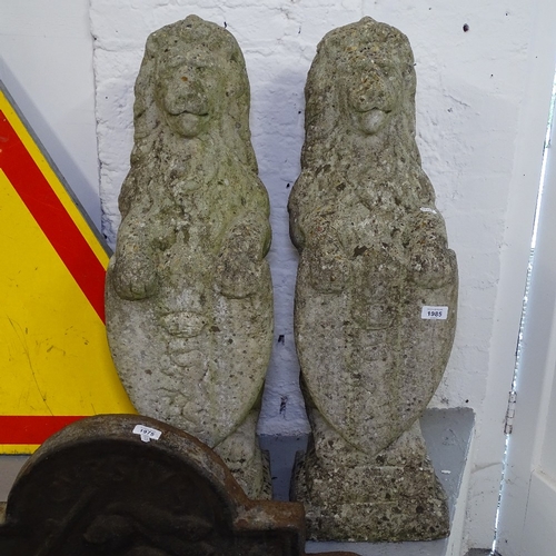 1985 - A pair of weathered concrete rampant heraldic lions