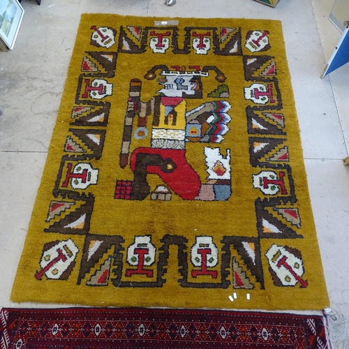 1987 - A 1970's design Ochre wool rug with figural design, 200cm x 145cm