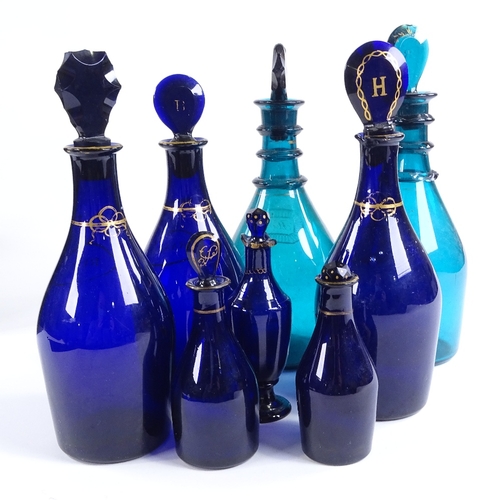 70 - A group of 8 various Bristol blue and green glass decanters and condiment bottles, with painted gild... 