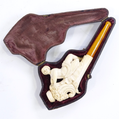 104 - A 19th century Meerschaum pipe surmounted by a nude reclining woman, length 13.5cm, original fitted ... 