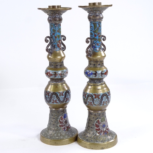 113 - A pair of Chinese bronze and champleve enamel candlesticks, height 30cm