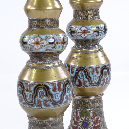 113 - A pair of Chinese bronze and champleve enamel candlesticks, height 30cm