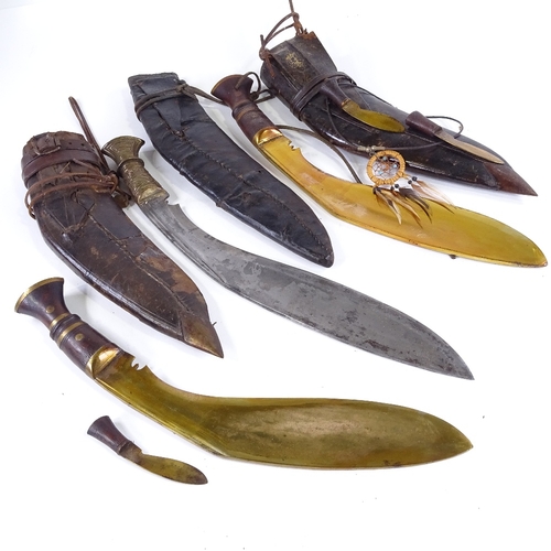 118 - 3 early 20th century Nepalese kukri knives, original leather scabbards, all with brass-mounted handl... 