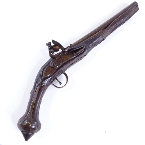 126 - An 18th century Continental flintlock pistol with brass mounts, overall length 46cm