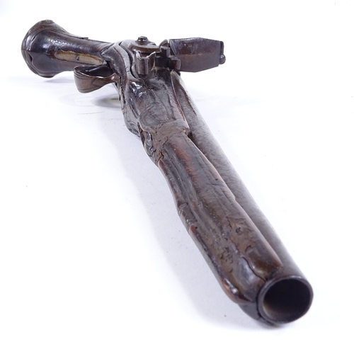 126 - An 18th century Continental flintlock pistol with brass mounts, overall length 46cm