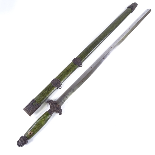 127 - A modern Chinese sword in brass-mounted simulated shagreen scabbard, overall length 105cm