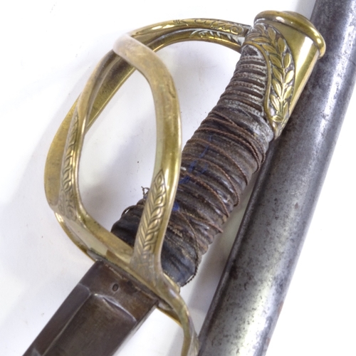 133 - A 19th century sabre, engraved brass basket hilt, with steel scabbard