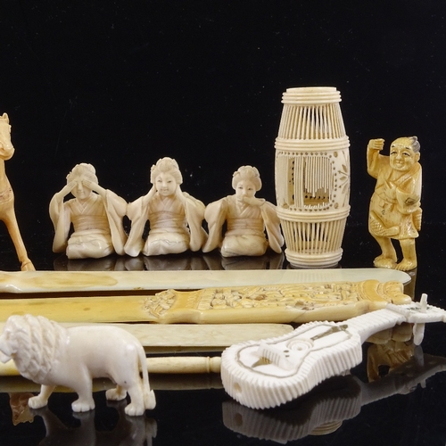 161 - A group of Chinese ivory paper knives, Japanese ivory figures, and other carvings