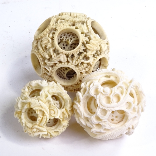 166 - A collection of 19th century Chinese ivory puzzle balls, some on stands