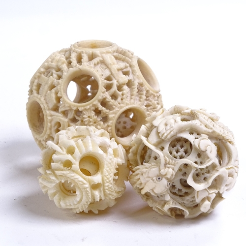 166 - A collection of 19th century Chinese ivory puzzle balls, some on stands