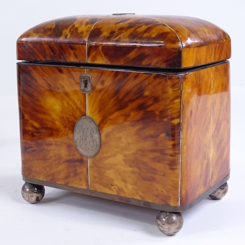 72 - A 19th century tortoiseshell tea caddy, inlaid silver wirework and silver ball feet, with inner lids... 