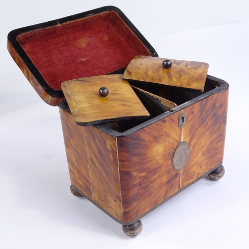 72 - A 19th century tortoiseshell tea caddy, inlaid silver wirework and silver ball feet, with inner lids... 