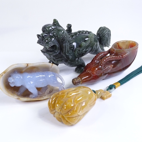 73 - A carved agate ceremonial cup in the form of an antelope head, length 14cm, a carved jade dragon, le... 