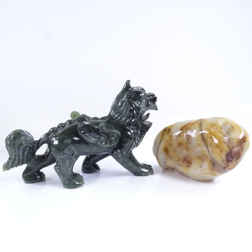 73 - A carved agate ceremonial cup in the form of an antelope head, length 14cm, a carved jade dragon, le... 