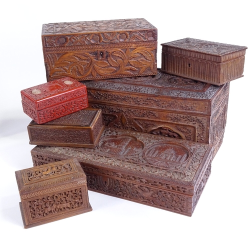 74 - A group of Indian and Chinese relief carved wood boxes, largest width 34cm (7)