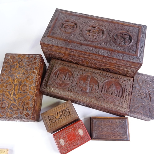 74 - A group of Indian and Chinese relief carved wood boxes, largest width 34cm (7)