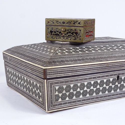 88 - A small 19th century French Boulle marquetry inlaid box, 9cm across, and an Indian Vizagapatam ivory... 