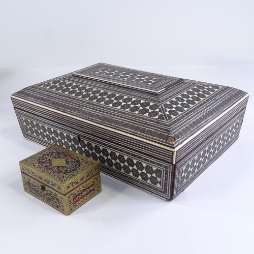 88 - A small 19th century French Boulle marquetry inlaid box, 9cm across, and an Indian Vizagapatam ivory... 