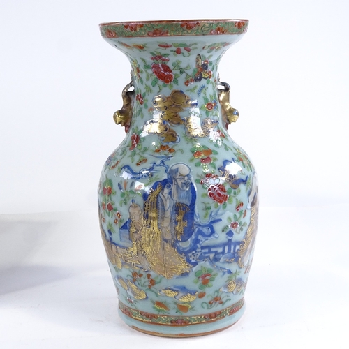 92 - A 19th century Chinese celadon glaze porcelain vase, with painted enamel birds flowers and butterfli... 