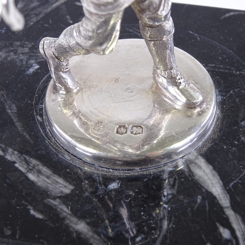 97 - A cast silver figure of a golfer on black marble base, maker's marks for James & William Deakin, no ... 