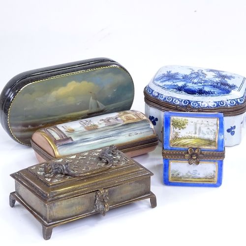 180 - A group of enamel porcelain and metal boxes, including a porcelain dome-top box containing perfume b... 