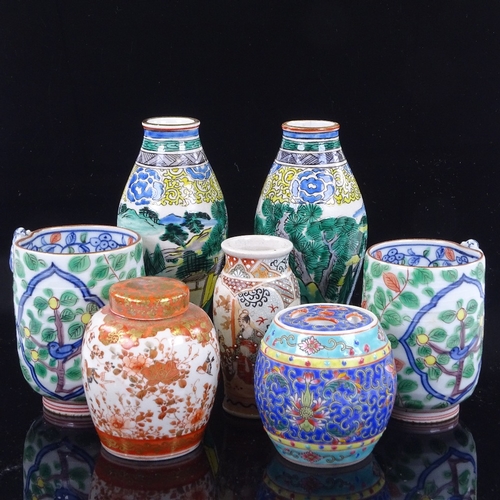 182 - A group of Oriental porcelain vases and pots, tallest vases height 14.5cm (7)