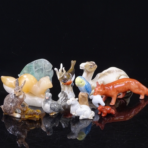 187 - A group of miniature porcelain and hardstone animals, including a carved cat's eye stoat, length 8cm