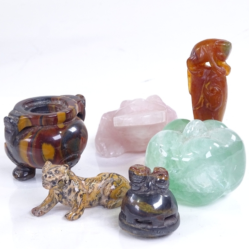 194 - A group of Chinese hardstone carvings, including a tiger iron incense burner and cover, height 7cm (... 