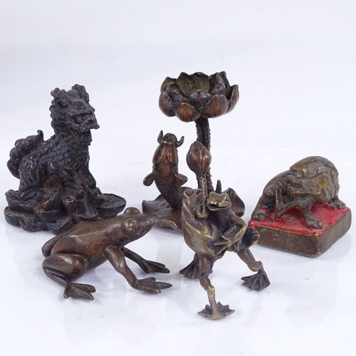 215 - A group of miniature Japanese bronzes, including a seated Dog of Fo, height 5.5cm, a carp under a li... 