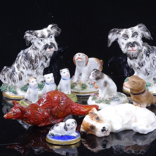 218 - A group of mainly 19th century porcelain animals, including a pair of Terriers, height 7cm