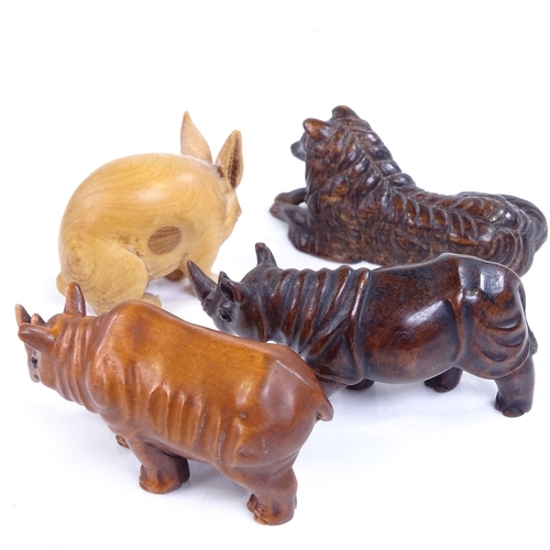 223 - 4 Japanese carved wood animal netsuke, including 2 signed rhino, length 6.5cm