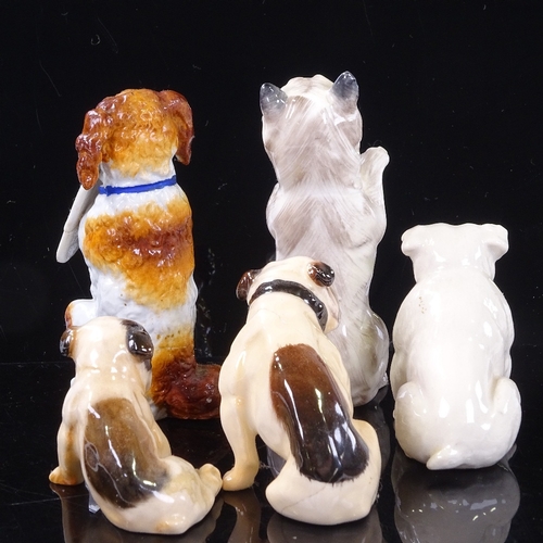 226 - A group of porcelain dog ornaments, including Doulton seated Terrier, height 9.5cm, 3 Doulton and Be... 