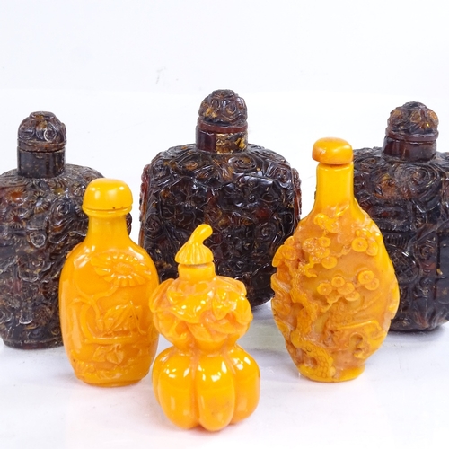 229 - A group of Chinese relief carved amber snuff bottles, largest height 8cm (6)