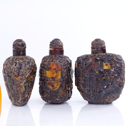 229 - A group of Chinese relief carved amber snuff bottles, largest height 8cm (6)