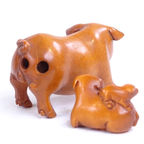 231 - 3 Japanese carved wood pig netsuke, largest length 5.5cm (3)