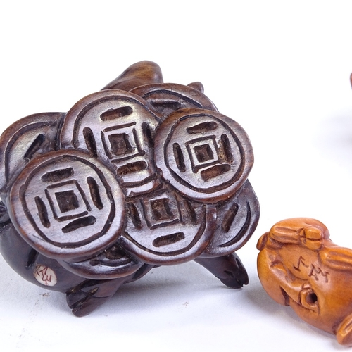 231 - 3 Japanese carved wood pig netsuke, largest length 5.5cm (3)