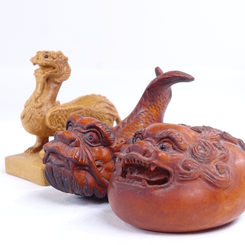 233 - 3 Japanese carved wood dragon design netsuke, including a dragon fish, length 6.5cm (3)