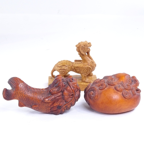 233 - 3 Japanese carved wood dragon design netsuke, including a dragon fish, length 6.5cm (3)