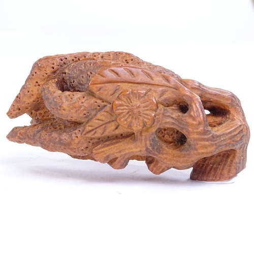 234 - 3 Japanese carved wood dragon and plant design netsuke, including a dragon with ball, length 6cm