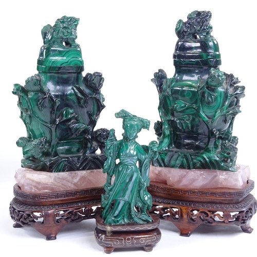 257 - A pair of Chinese relief carved malachite pots and covers on rose quartz and hardwood stands, height... 