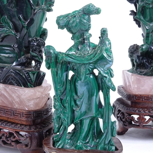 257 - A pair of Chinese relief carved malachite pots and covers on rose quartz and hardwood stands, height... 