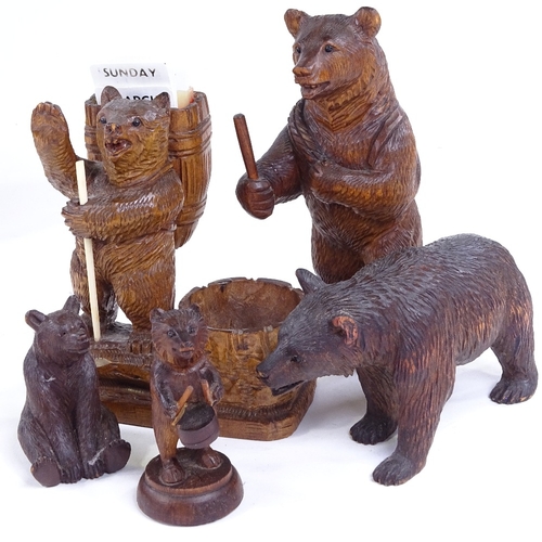 262 - A group of 19th century Black Forest carved wood bears, tallest 16cm (5)