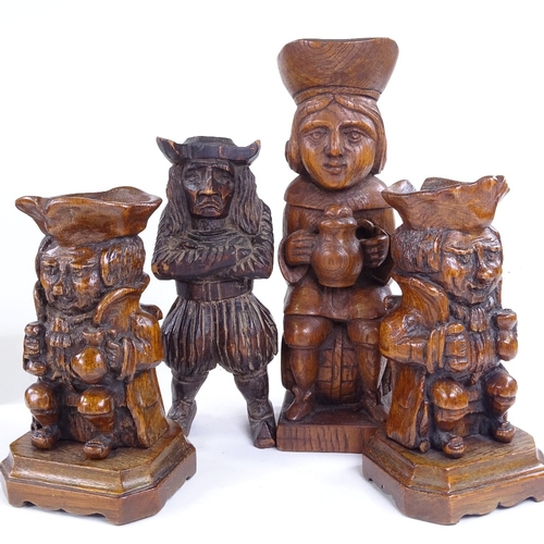 263 - A pair of carved oak Toby figure candle stands, height 22cm, and 2 other wood carvings (4)