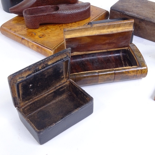 268 - A group of treen snuffboxes, a shoe design box with swivel lid, length 8.5cm, a carved wood box with... 