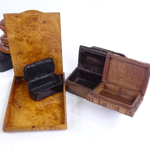 268 - A group of treen snuffboxes, a shoe design box with swivel lid, length 8.5cm, a carved wood box with... 