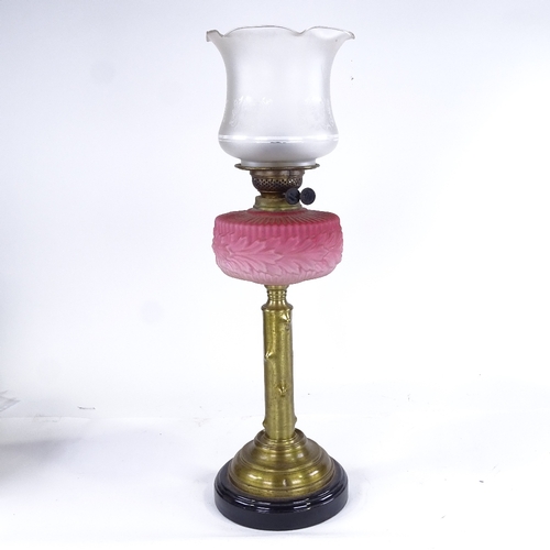 321 - A brass and pink opalescent glass oil lamp, with etched glass shade, overall height including shade ... 