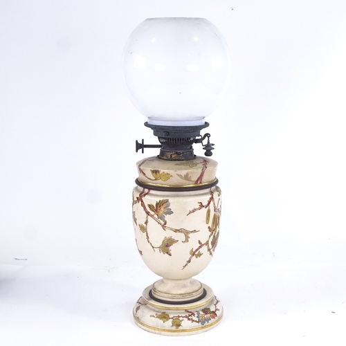 322 - Royal Worcester ceramic oil lamp, with gilded and painted decoration, Hinks fitting, milk glass shad... 