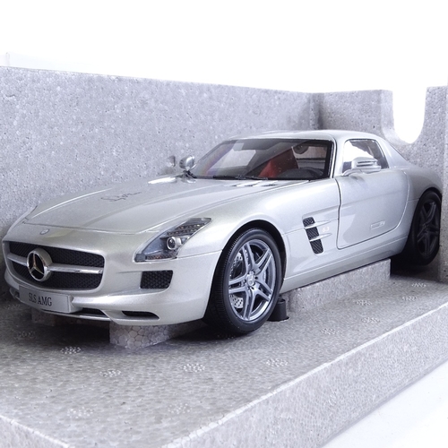 356 - A diecast Mercedes-Benz SLS-AMG McLaren Edition signed by Sir Stirling Moss, Limited Edition no 1 of... 